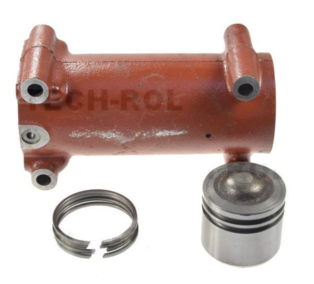 Cylinder podnośnika z tłokiem i pierścieniami metalowymi